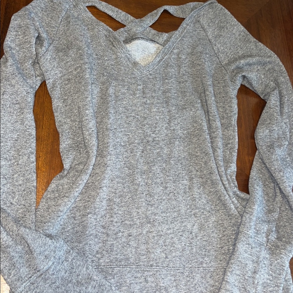 grey form fitting sweater